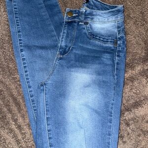 Fashion Nova Distressed Blue Skinny Jeans
